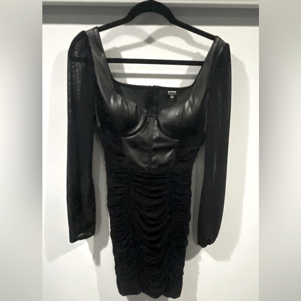 Brand new with tags black dress.